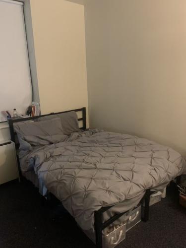 The actual room is much more spacious than the photos show, and it is the largest bedroom in the 4B2B unit.