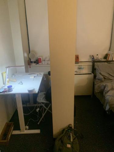 The room is a bit messy right now, but don't worry, I'll clean and tidy everything up before you move in!