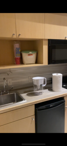Mini fridge and cabinets for storage