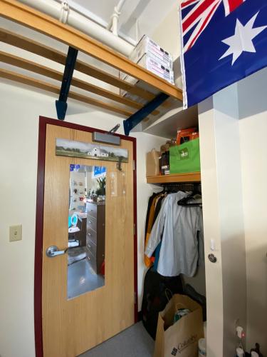 Broad view of clothes hangers and hamper