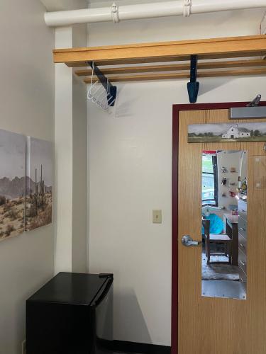 Corner view of door and fridge