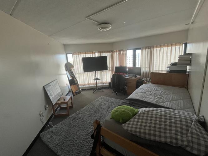 Room showing amenities including standing mirror, 2 TV Monitors and a TV