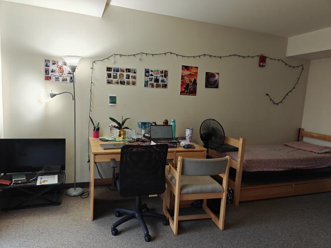 Dedicated work space and twin bed