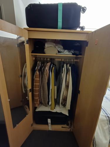 Bedroom cupboard with mirror on inside of left door (will be empty by the time you move in of course!)
