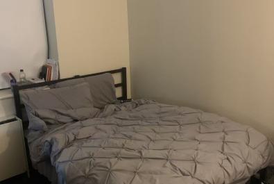 The actual room is much more spacious than the photos show, and it is the largest bedroom in the 4B2B unit.