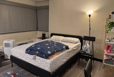 Queen sized bed with memory foam mattress